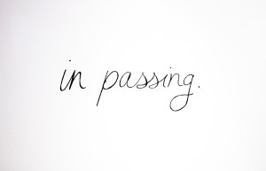 IN PASSING